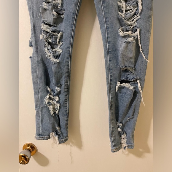 American Eagle High Waist Distressed Jeans with Frayed Bottom. - Picture 2 of 6